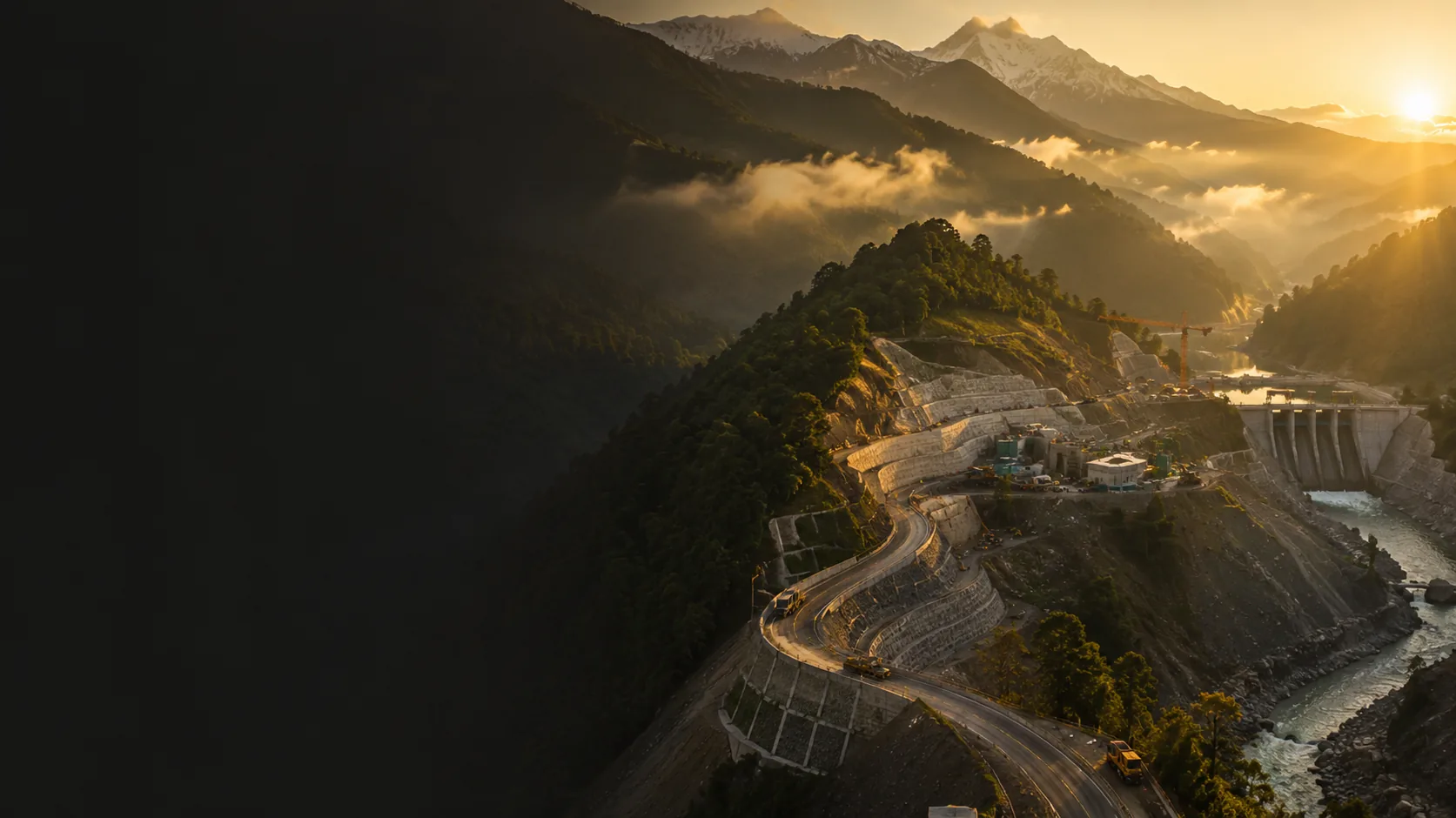 OSRC excavator building a mountain highway through the Nepali hills at dusk